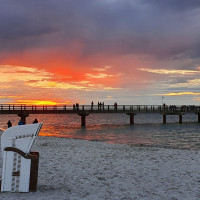 Sonnenuntergang am Strand Prerow mit Strandkörben